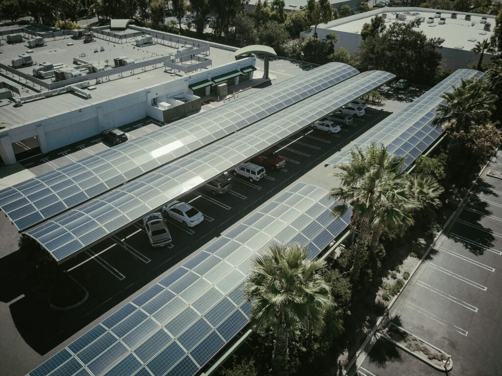 gas-pipeline Aerial view of a parking lot with solar panel canopies, showcasing clean energy usage.